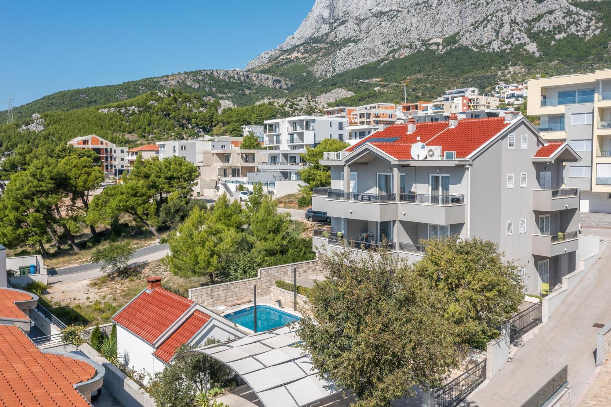 Villa Em Makarska Bagian luar foto